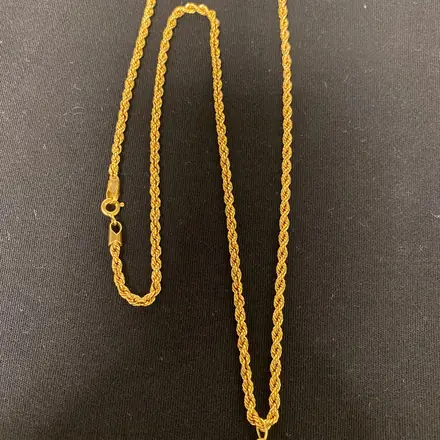 Corrente de ouro com pingente de coração