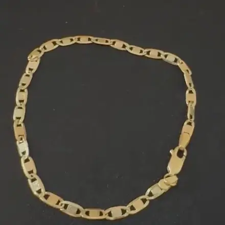 Vídeo: pulseira de ouro de malha achatada