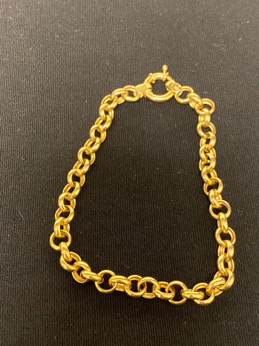 Corrente de ouro de elos redondos com fecho de argola